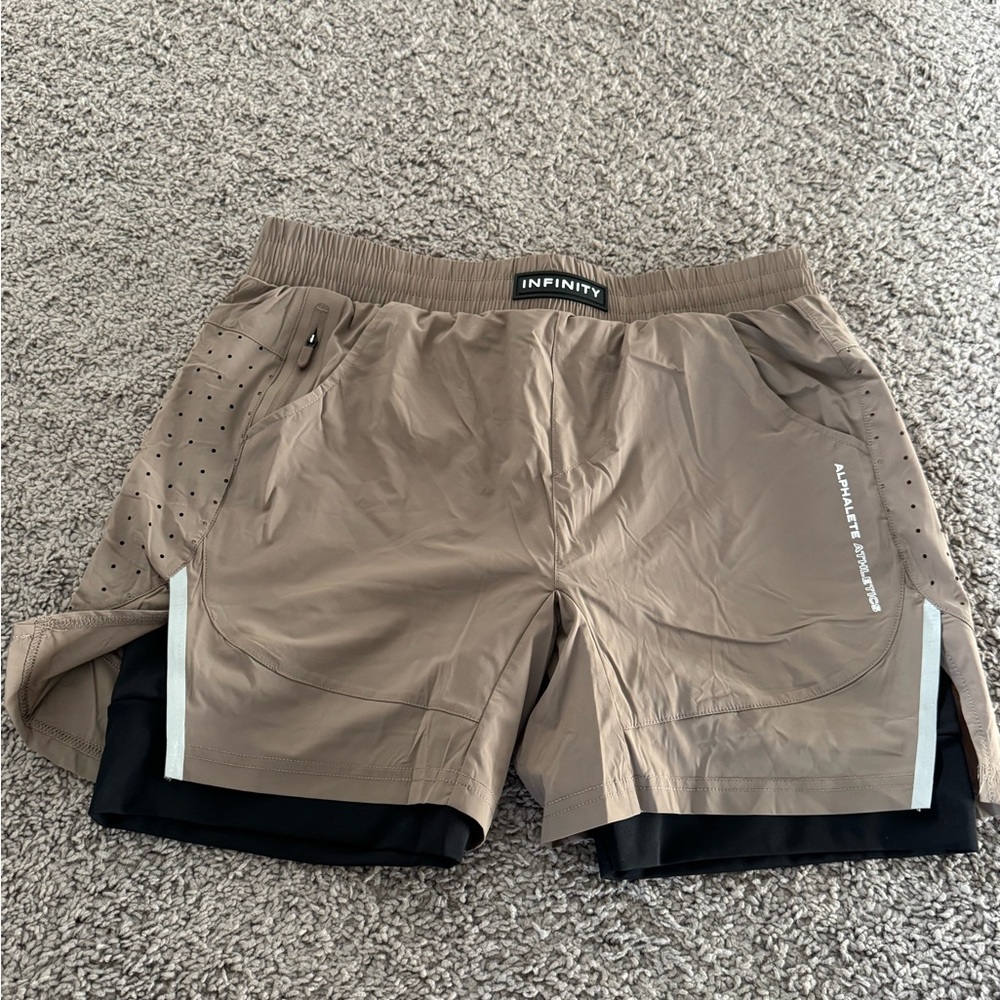 Alphalete Shorts
5” inch inseam 
Built in liner 
Size L